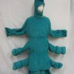 green caterpillar with six legs